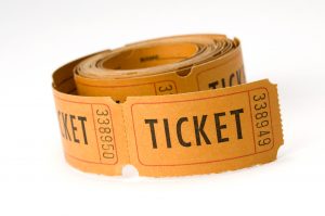 orange ticket stubs on white background, either say ticket or keep this coupon